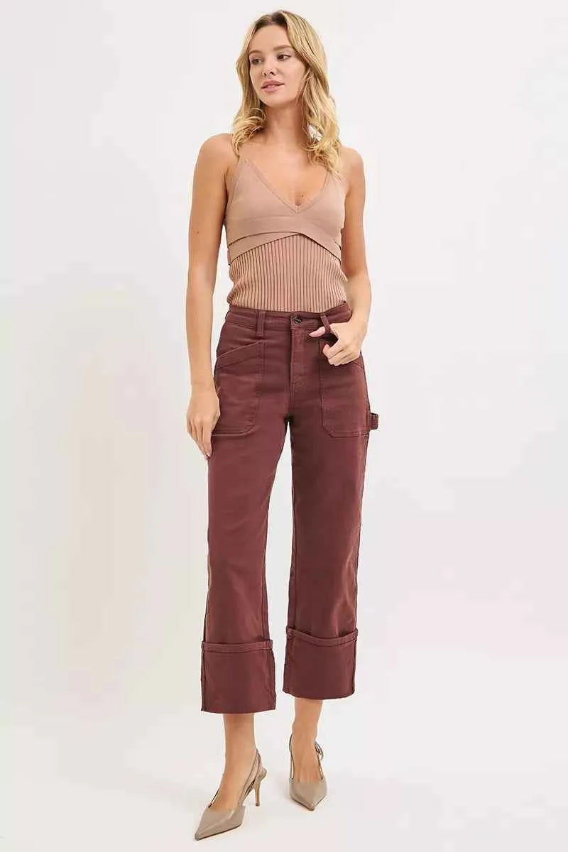 Plus size RISEN high rise wide straight cuffed jeans by Trendsi, showcasing denim with patch details and a relaxed fit.