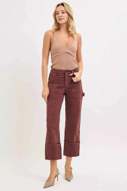 Plus size RISEN high rise wide straight cuffed jeans by Trendsi, showcasing denim with patch details and a relaxed fit.