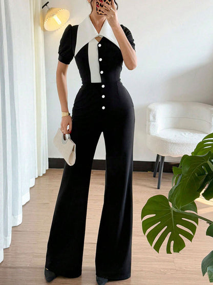Black contrast button-down wide-leg jumpsuit by Trendsi, featuring a stylish jumpsuit design with a flattering fit.