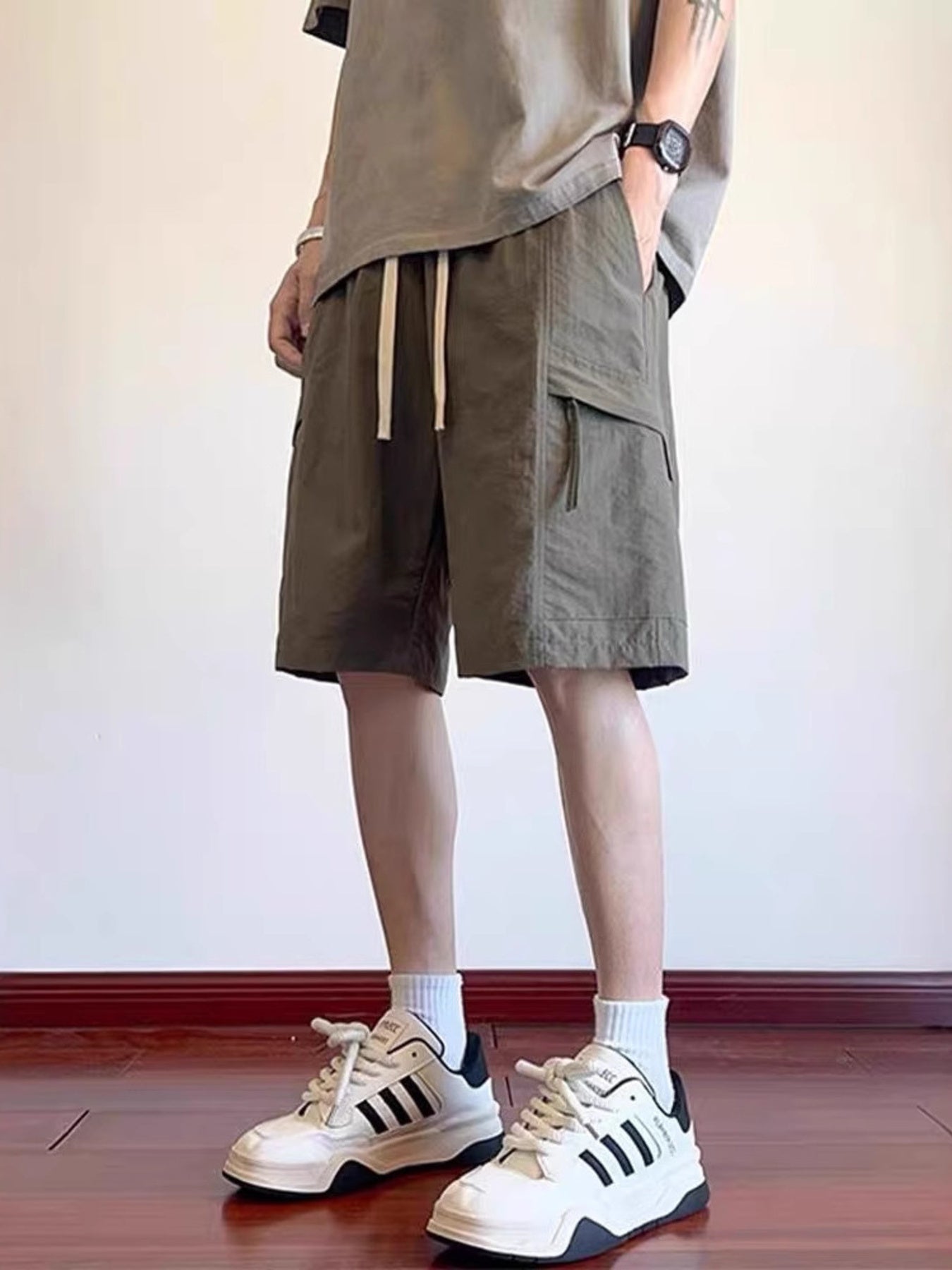 Men's plus size khaki cargo shorts with drawstring waistband and relaxed fit, casual men's fashion by Trendsi.