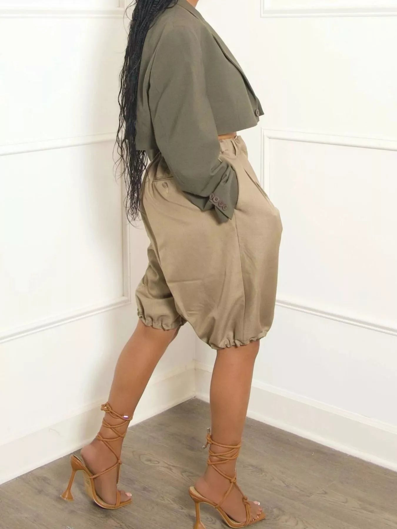Khaki high waist shorts with pleated detail from Trendsi, featuring a stylish and comfortable fit.