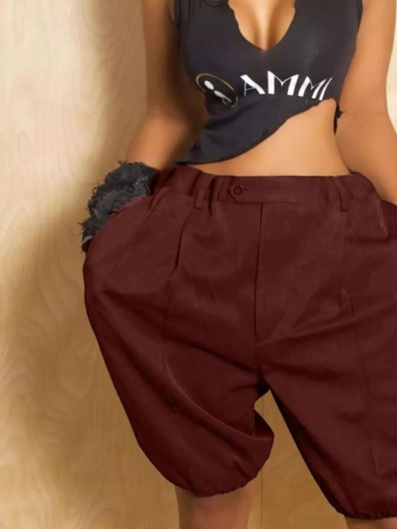 Khaki high waist shorts with pleated details from Trendsi, featuring a stylish and comfortable fit.