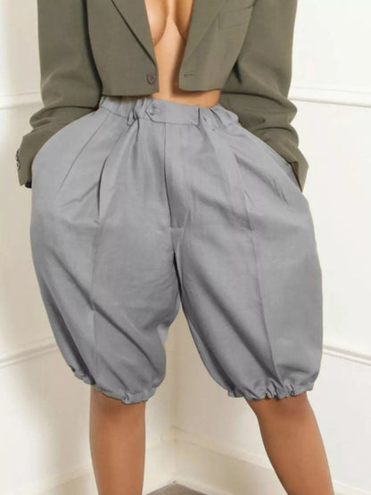 High waist shorts with pleated details from Trendsi, featuring a stylish and comfortable design perfect for warm weather.