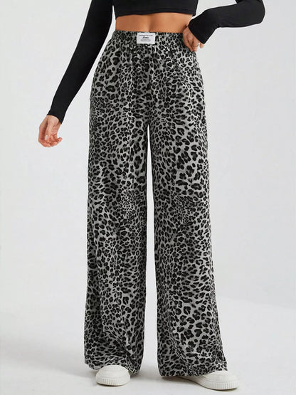 Full size leopard print wide-leg pants from Trendsi, featuring a bold animal pattern and relaxed fit for stylish comfort.