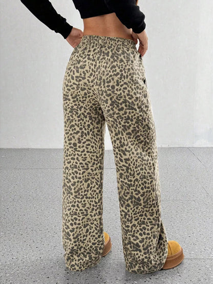 Plus size leopard print wide leg pants from Trendsi, featuring a full-length design and bold animal print fabric.