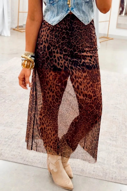 Leopard sheer midi skirt by Trendsi featuring a flowy, semi-transparent fabric with a stylish leopard print design.