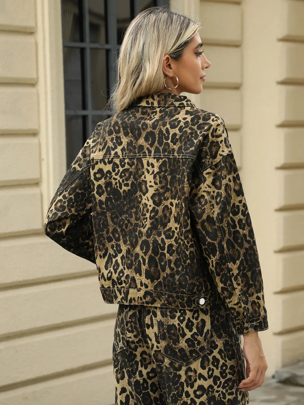Leopard print long sleeve denim jacket with pockets from Trendsi, featuring a stylish and casual design.