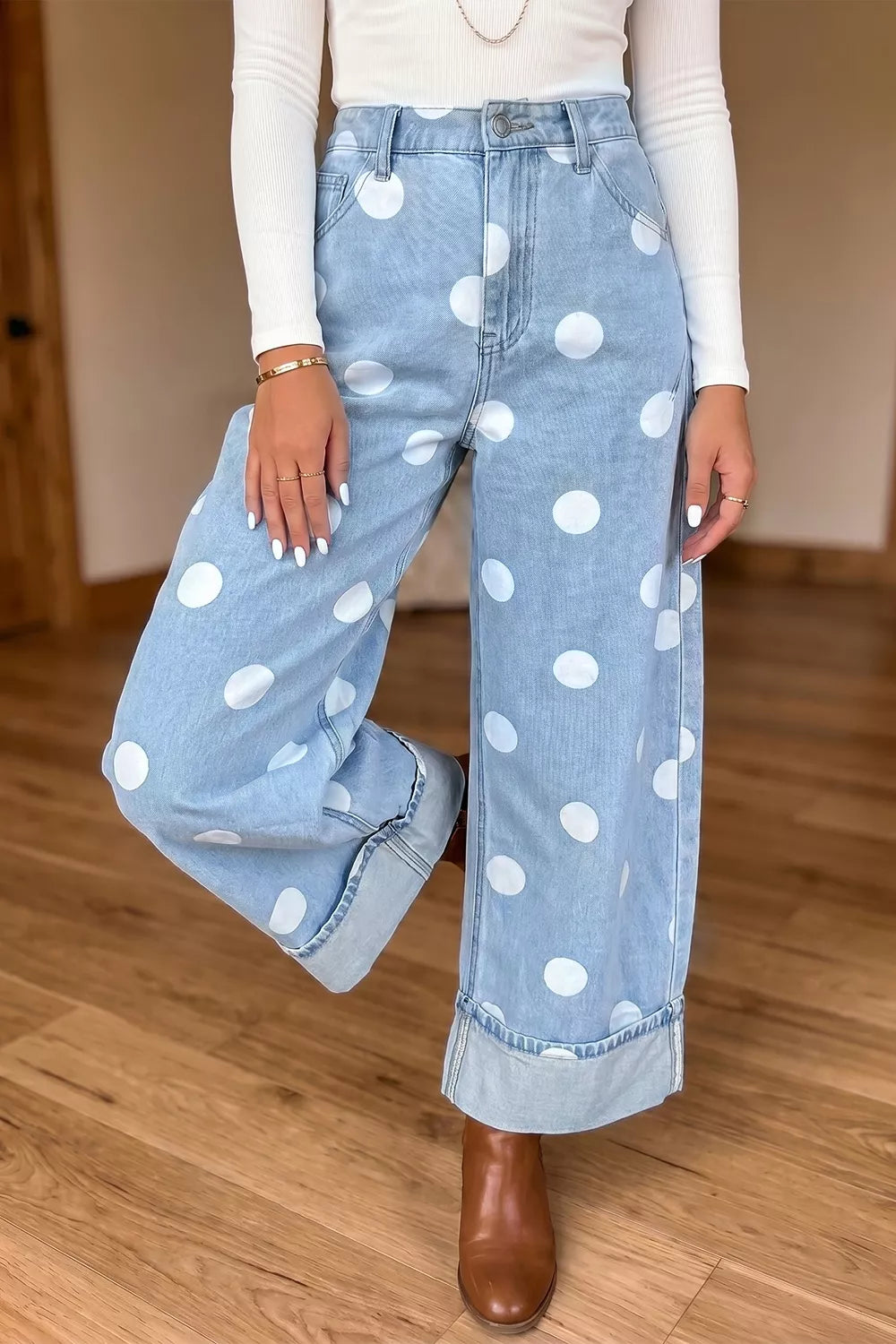 Light blue polka dot ankle-length casual jeans with metal buttons from Trendsi, showcasing relaxed fit and stylish design.