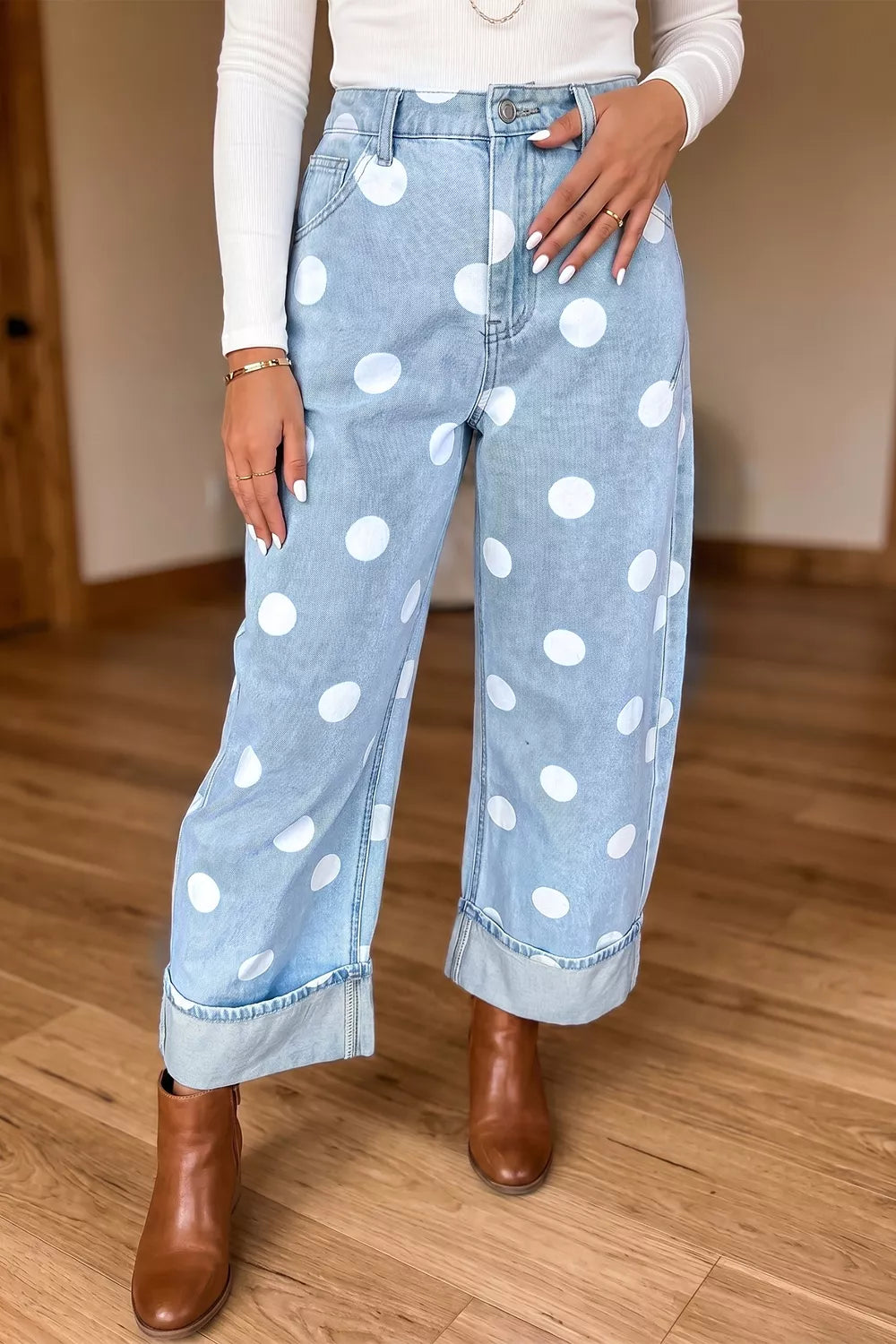 Light blue polka dot ankle-length casual jeans with metal buttons from Trendsi, showcasing a relaxed fit and stylish design.