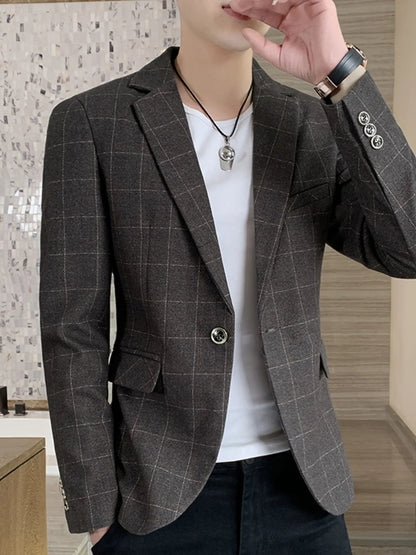 Light blue men's plus size slim fit plaid blazer by Trendsi, showing tailored fit and classic plaid pattern.