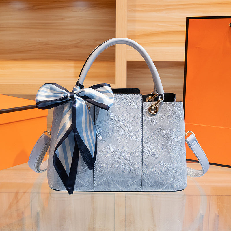 Light blue top-handle handbag by Trendsi with a sleek design and one-size features, perfect for stylish everyday use.