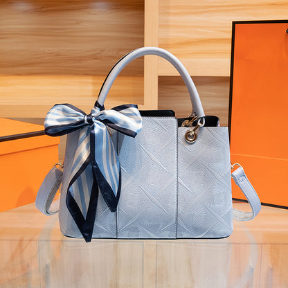 Light blue top-handle handbag by Trendsi with a sleek design and one-size features, perfect for stylish everyday use.