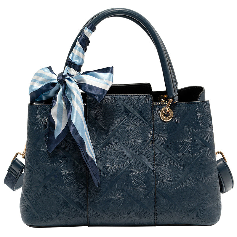 Light blue top-handle handbag by Trendsi featuring a sleek design and single top handle, perfect for stylish everyday use.