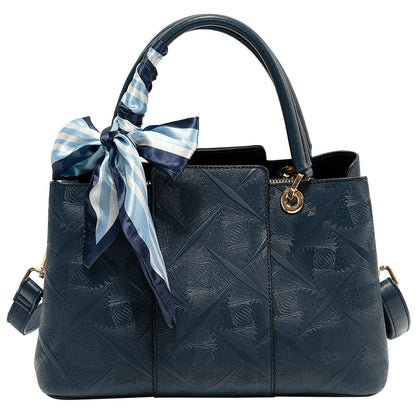 Light blue top-handle handbag by Trendsi featuring a sleek design and single top handle, perfect for stylish everyday use.