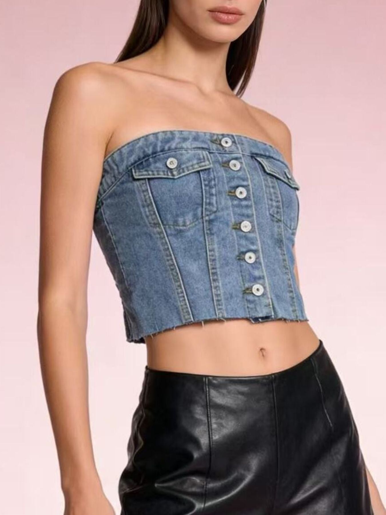 Light blue button-front strapless denim top by Trendsi, featuring a fitted design and sleeveless style.