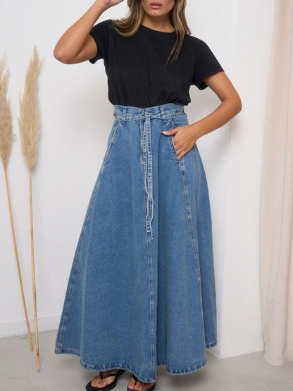 Light blue high-waisted denim skirt by Trendsi, shown with a fitted silhouette and classic denim details.