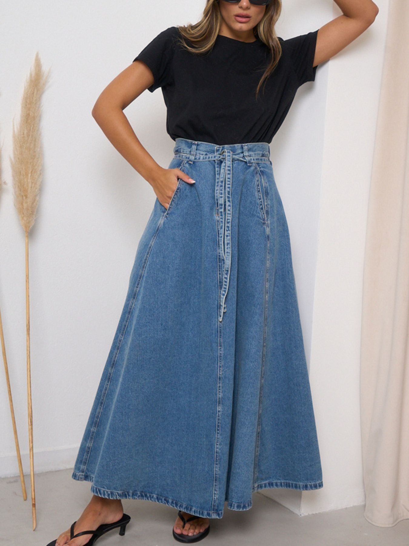 Light blue high-waisted denim skirt from Trendsi, featuring classic stitching and a fitted waistband.