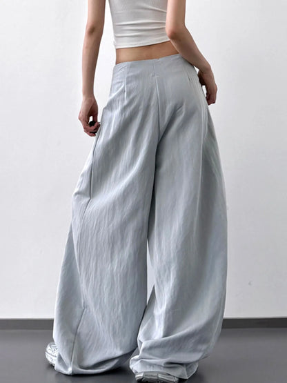 Light blue lace detail wide-leg pants by Trendsi, featuring flowing fabric and elegant design for a stylish look.