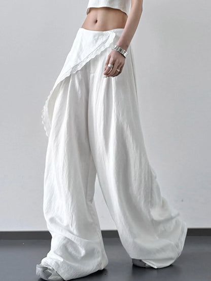 Light blue lace detail wide leg pants by Trendsi, featuring flowing fabric and elegant lace accents for a stylish look.