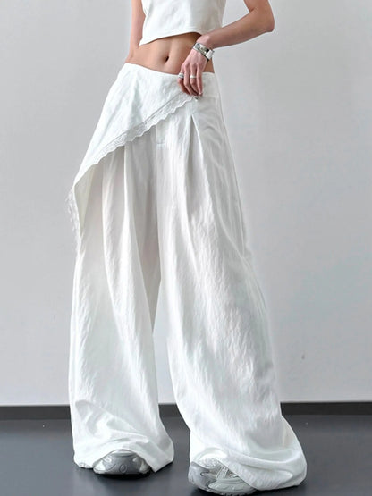 Light blue lace detail wide leg pants by Trendsi, featuring flowy fabric and elegant design for a relaxed, stylish look.