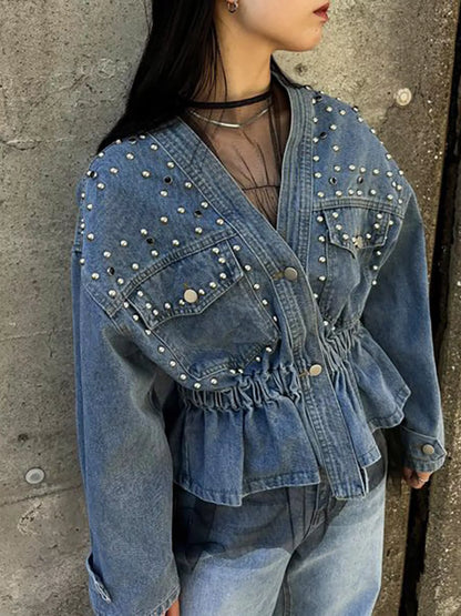 Light blue studded button-up denim jacket by Trendsi, featuring metal stud accents and classic collar design.