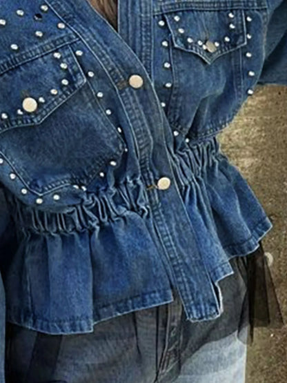 Light blue studded button-up denim jacket from Trendsi, featuring metal studs and classic collar design.