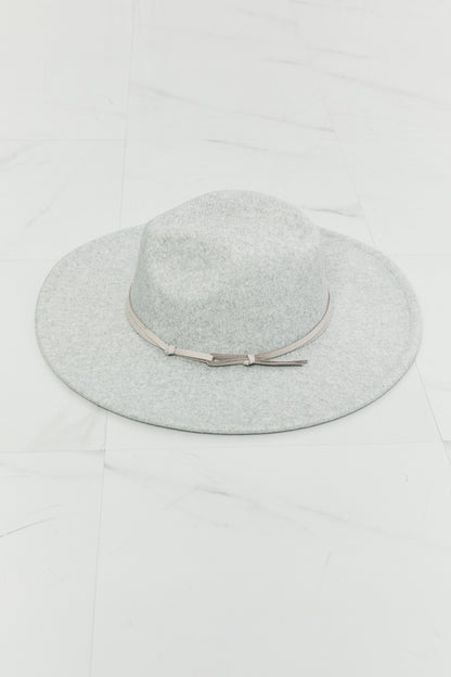 Light gray Fame Festival Babe Fedora Hat by Trendsi, showcasing a stylish wide-brim fedora with a classic design.