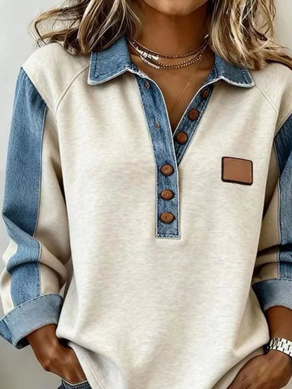 Light gray denim trim sweatshirt with button details by Trendsi, featuring a casual fit and stylish denim accents.