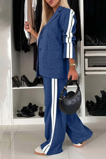 Full size contrast lapel collar top and pants set by Trendsi, featuring a stylish coordinated outfit with a lapel collar design.
