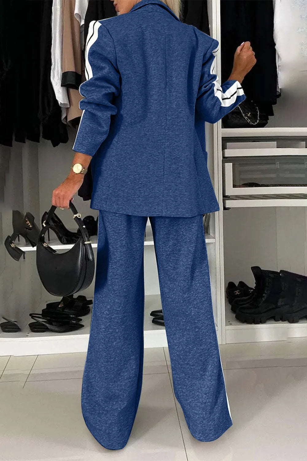 Full size contrast lapel collar top and pants set by Trendsi, featuring a stylish coordinated outfit with a lapel collar design.