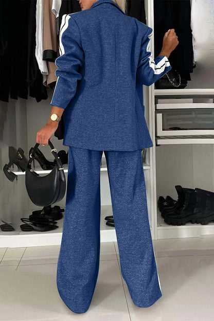 Full size contrast lapel collar top and pants set by Trendsi, featuring a stylish coordinated outfit with a lapel collar design.