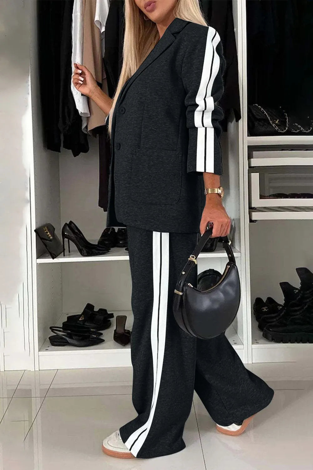 Full size contrast lapel collar top and pants set by Trendsi, featuring a stylish coordinated outfit with a lapel collar design.
