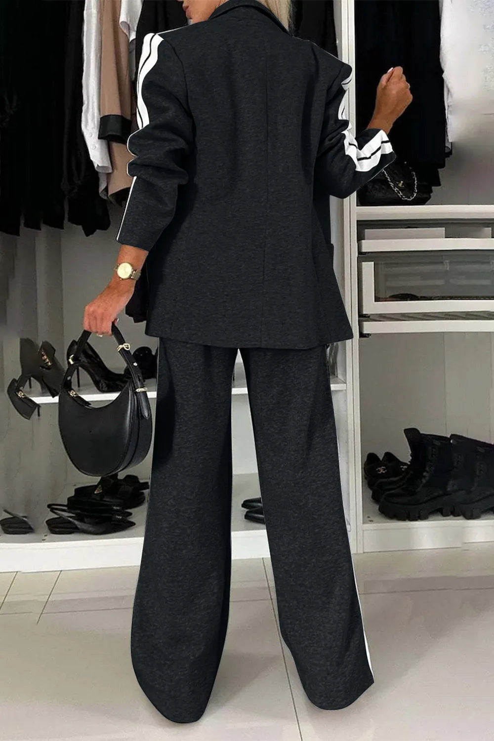Full size contrast lapel collar top and pants set by Trendsi, featuring a stylish coordinated outfit with a lapel collar design.