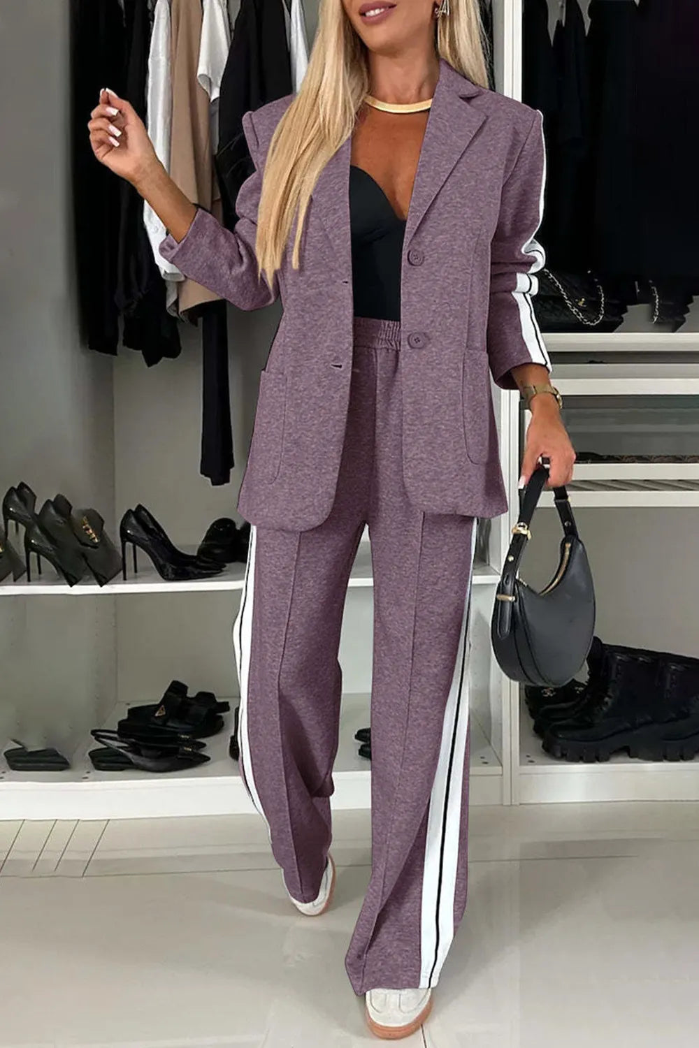 Full size contrast lapel collar top and pants set by Trendsi, featuring a stylish coordinated outfit with a lapel collar and matching pants.