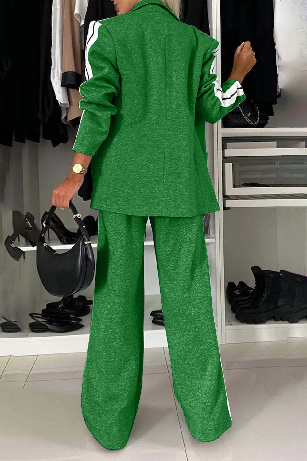Full size contrast lapel collar top and pants set by Trendsi, featuring a stylish, coordinated look with a lapel collar design.