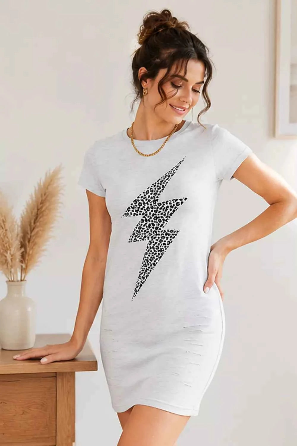 Light gray leopard lightning graphic dress by Trendsi, featuring bold print and stylish, edgy design for a fashionable look.
