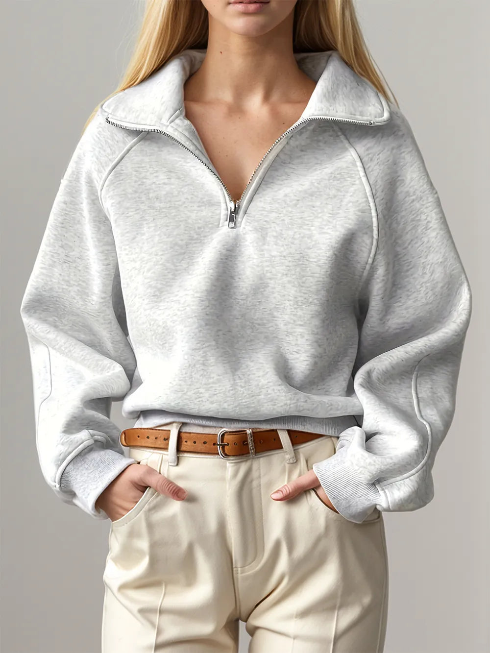 Light gray Trendsi half zip long sleeve sweatshirt, XS size, shown flat with zipper detail and soft fabric texture.