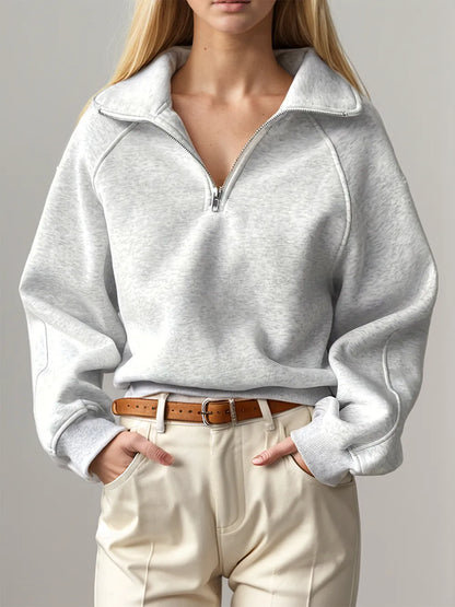 Light gray Trendsi half zip long sleeve sweatshirt, XS size, shown flat with zipper detail and soft fabric texture.