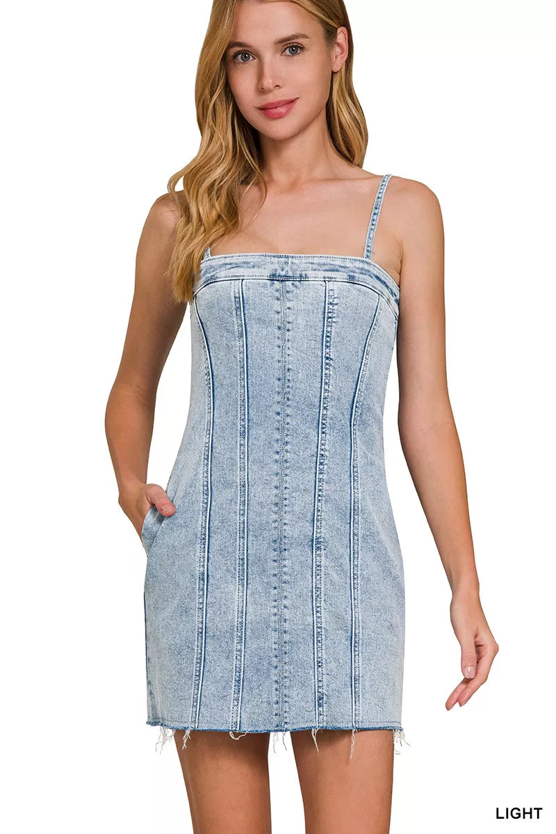 Light-wash Zenana spaghetti strap dress with exposed seam details, featuring a casual and stylish design.
