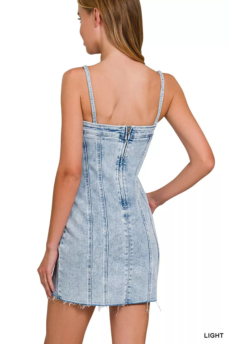 Light-wash Zenana spaghetti strap dress with exposed seam details, stylish and casual, perfect for summer wear.