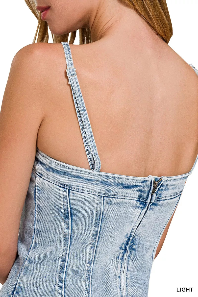 Light-wash Zenana spaghetti strap dress with exposed seams, featuring a casual and stylish fit, perfect for warm weather.