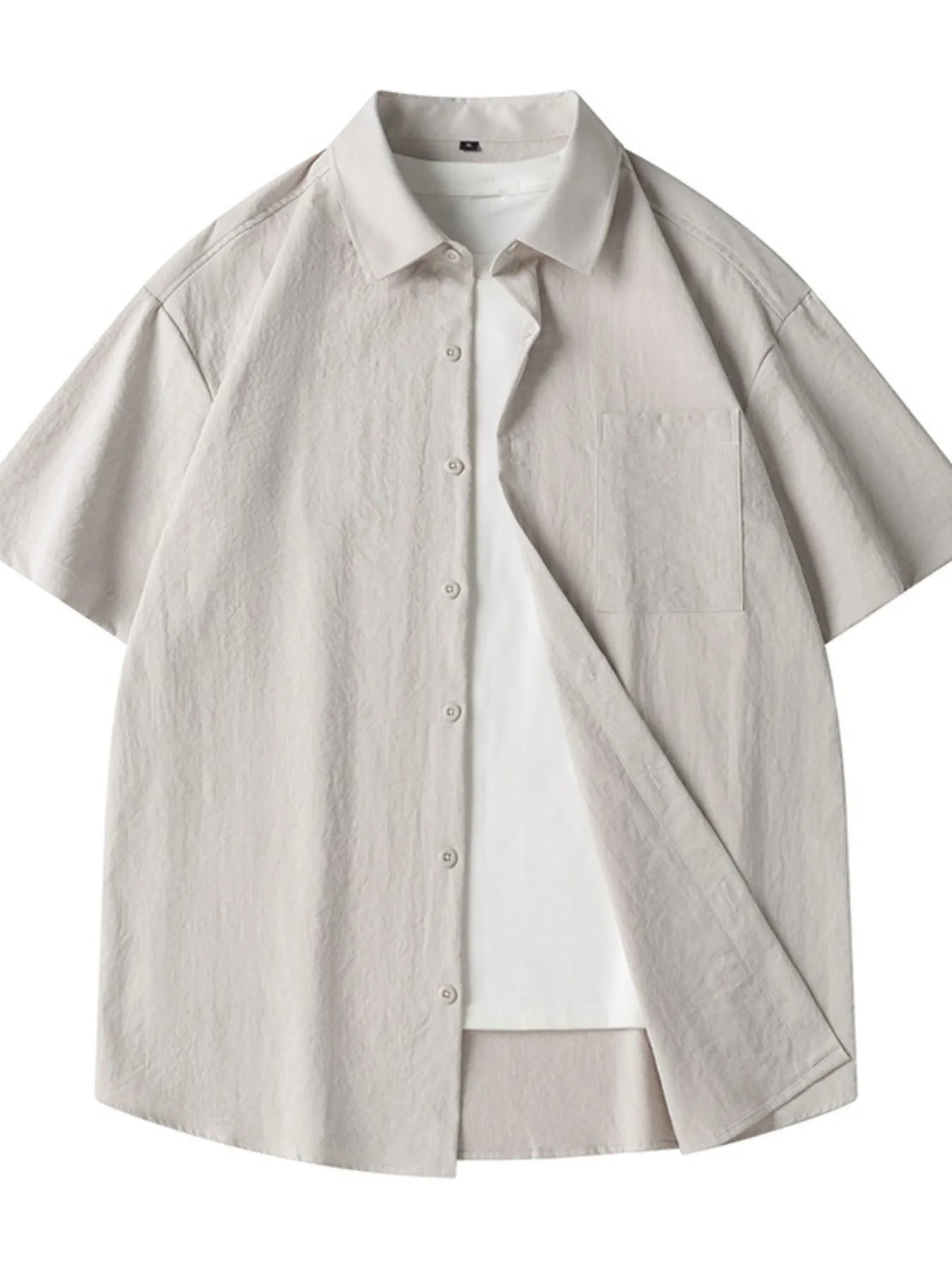 Light yellow men's plus size casual short sleeve shirt from Trendsi, featuring a loose fit and comfortable design.