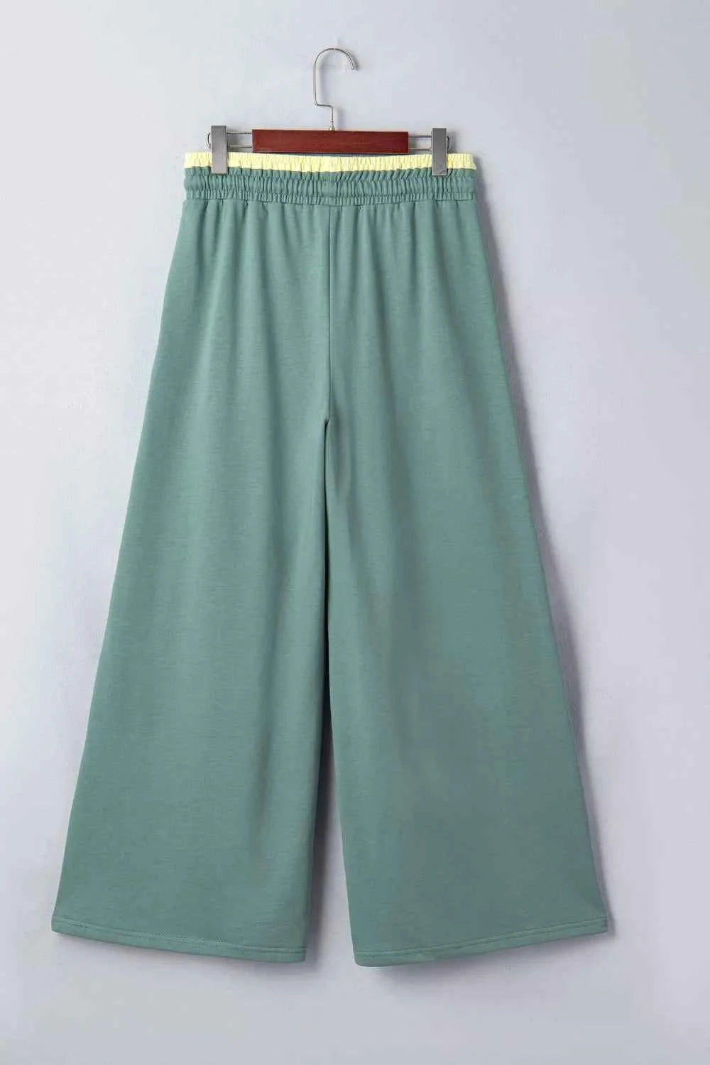 Turquoise floral patchwork wide leg lounge pants by Trendsi, featuring a relaxed fit and stylish design.