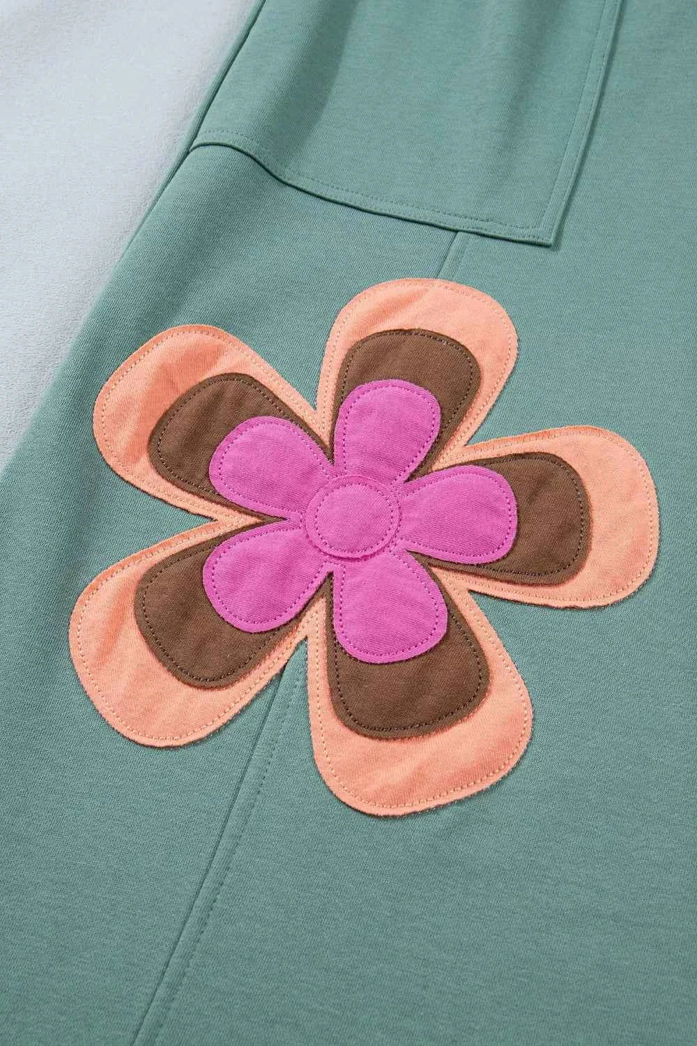 Turquoise floral patchwork wide leg lounge pants from Trendsi, featuring a relaxed fit and stylish design.