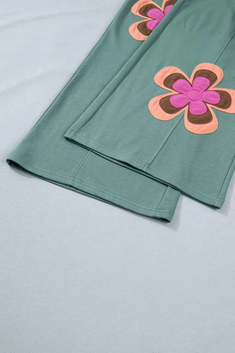 Turquoise floral patchwork wide-leg lounge pants from Trendsi, featuring a relaxed fit and stylish design.