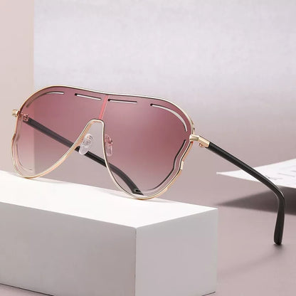 Oversized aviator sunglasses with gradient lenses and mauve frames, Trendsi brand, stylish and protective eyewear for sunny days.