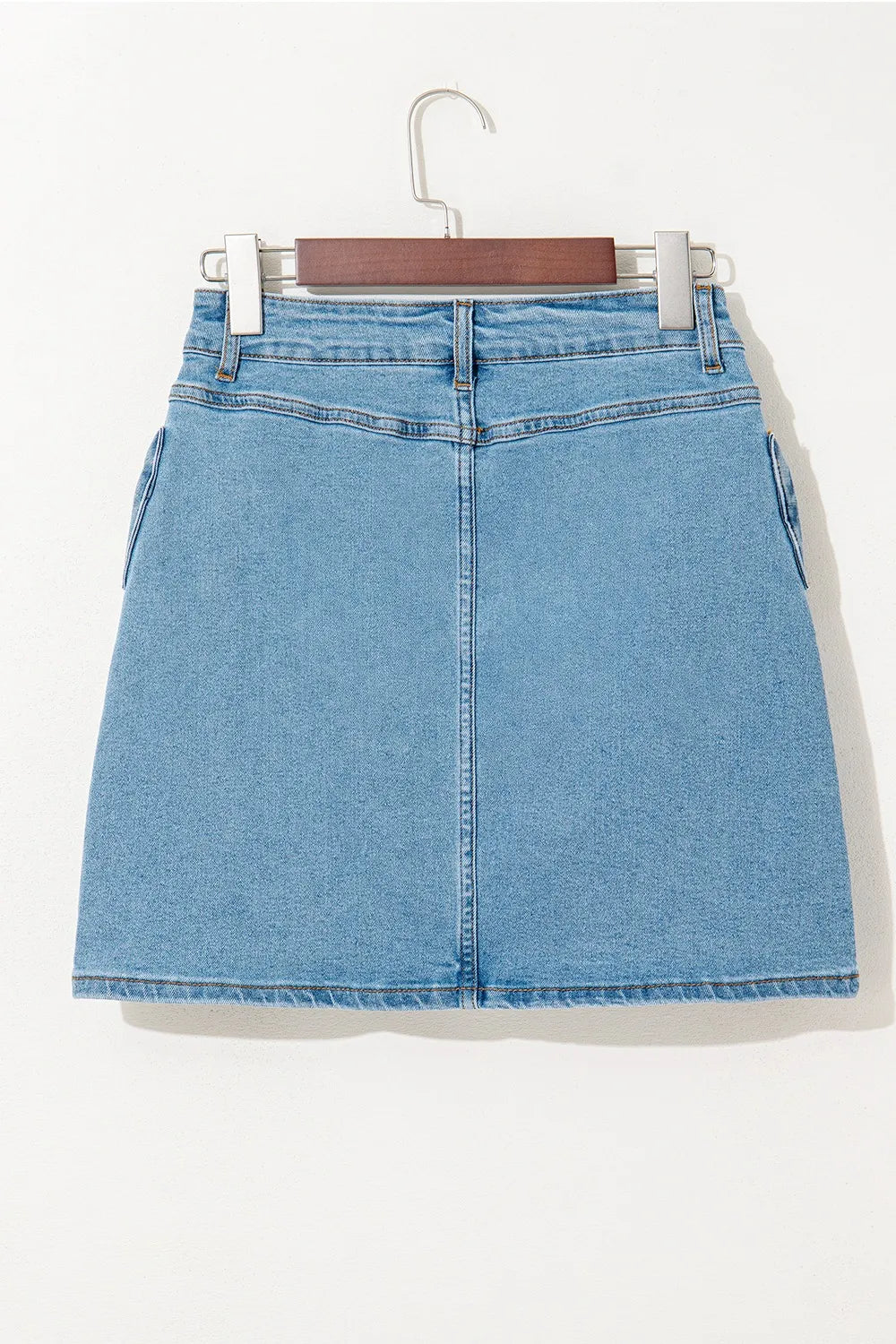 Acid wash high waist denim skirt with bowknot details, trendy Trendsi fashion, casual and stylish women's skirt.
