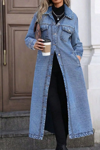 Longline button-front denim jacket by Trendsi, featuring classic blue denim, chest pockets, and a relaxed, casual fit.