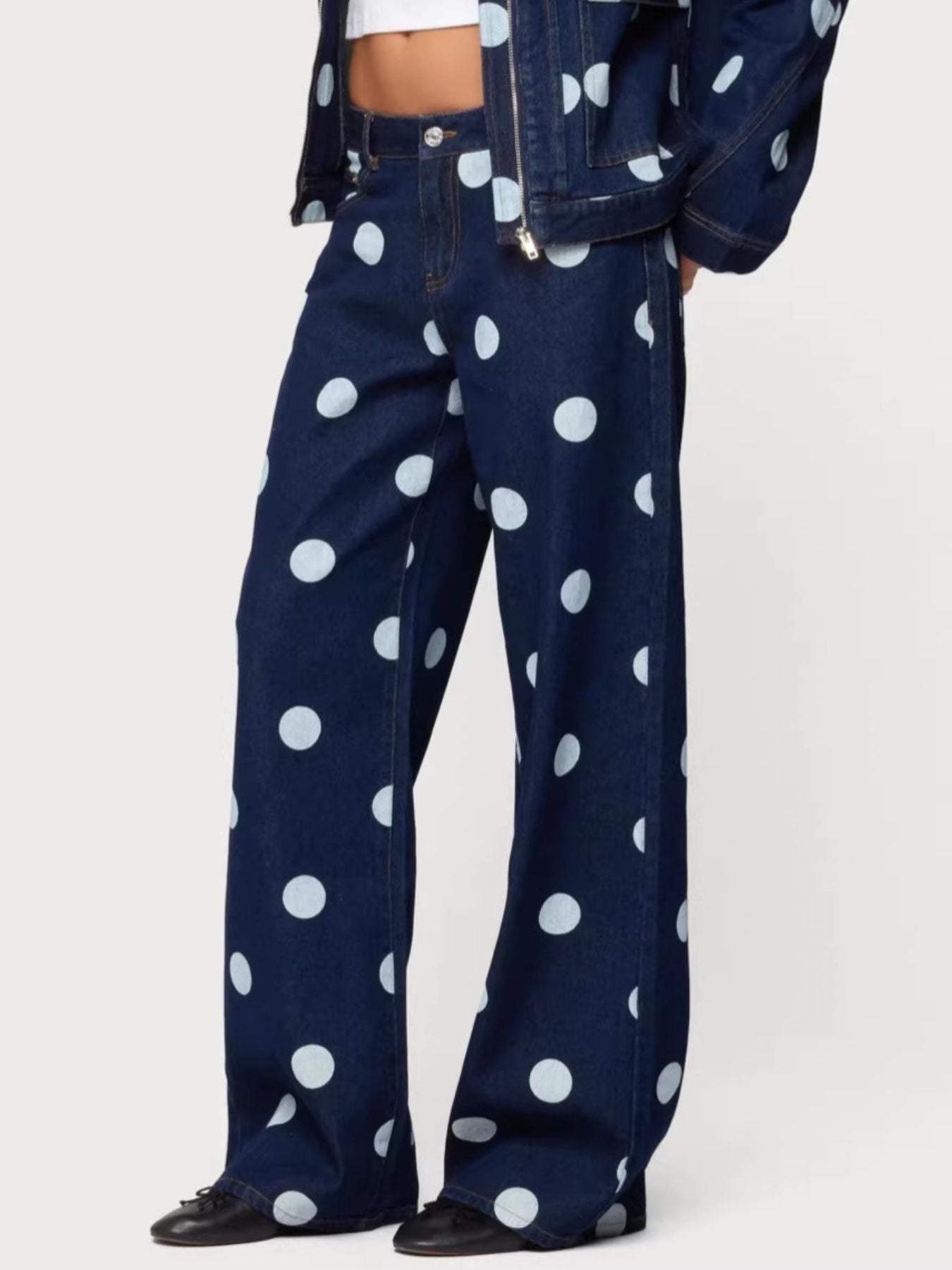 Trendsi polka dot wide leg jeans with high waist and relaxed fit, featuring a playful black and white pattern.
