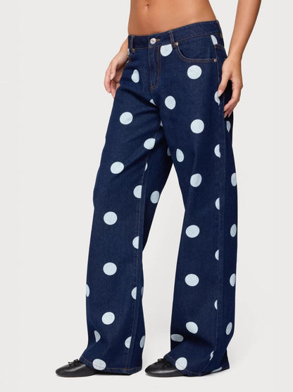 Trendsi polka dot wide-leg jeans with high waist and relaxed fit, featuring bold black and white polka dot pattern.